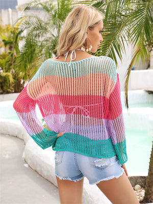 Rainbow mesh cover-up with flared sleeves and horizontal stripes in pink, orange, lavender, and turquoise.