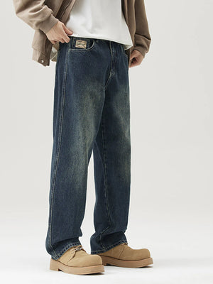 Relaxed fit vintage blue wash denim jeans with a faded look.
