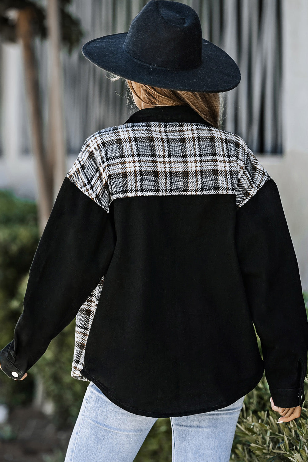 Plaid panel denim shirt jacket in black with a plaid yoke and sleeves.