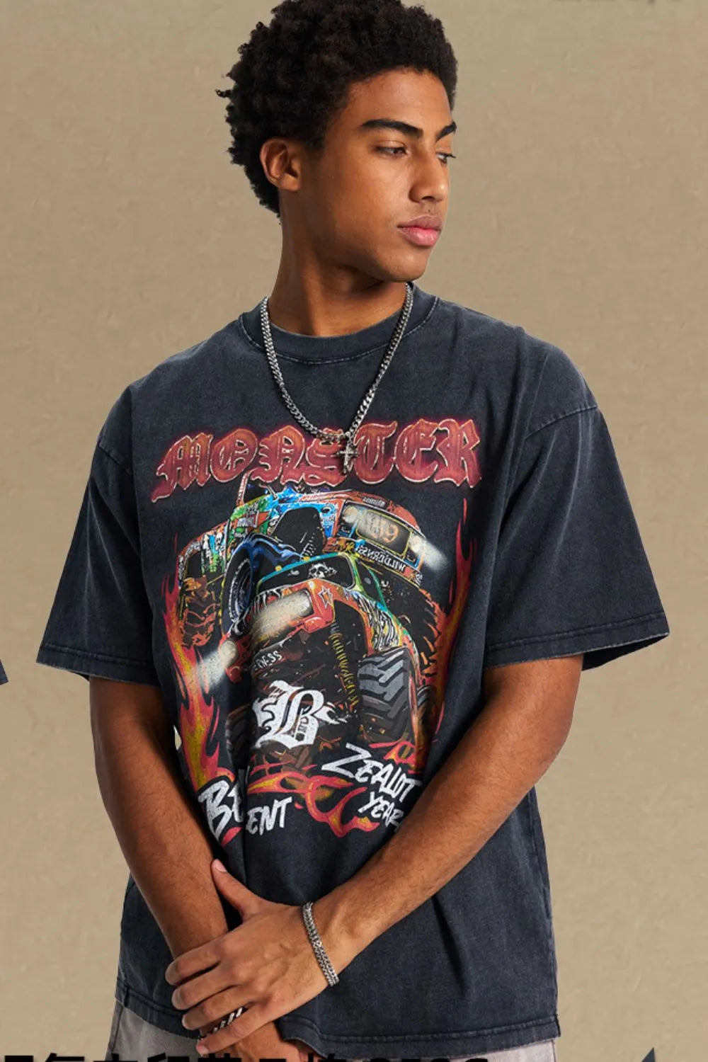 Black vintage graphic tee with monster truck and flames design