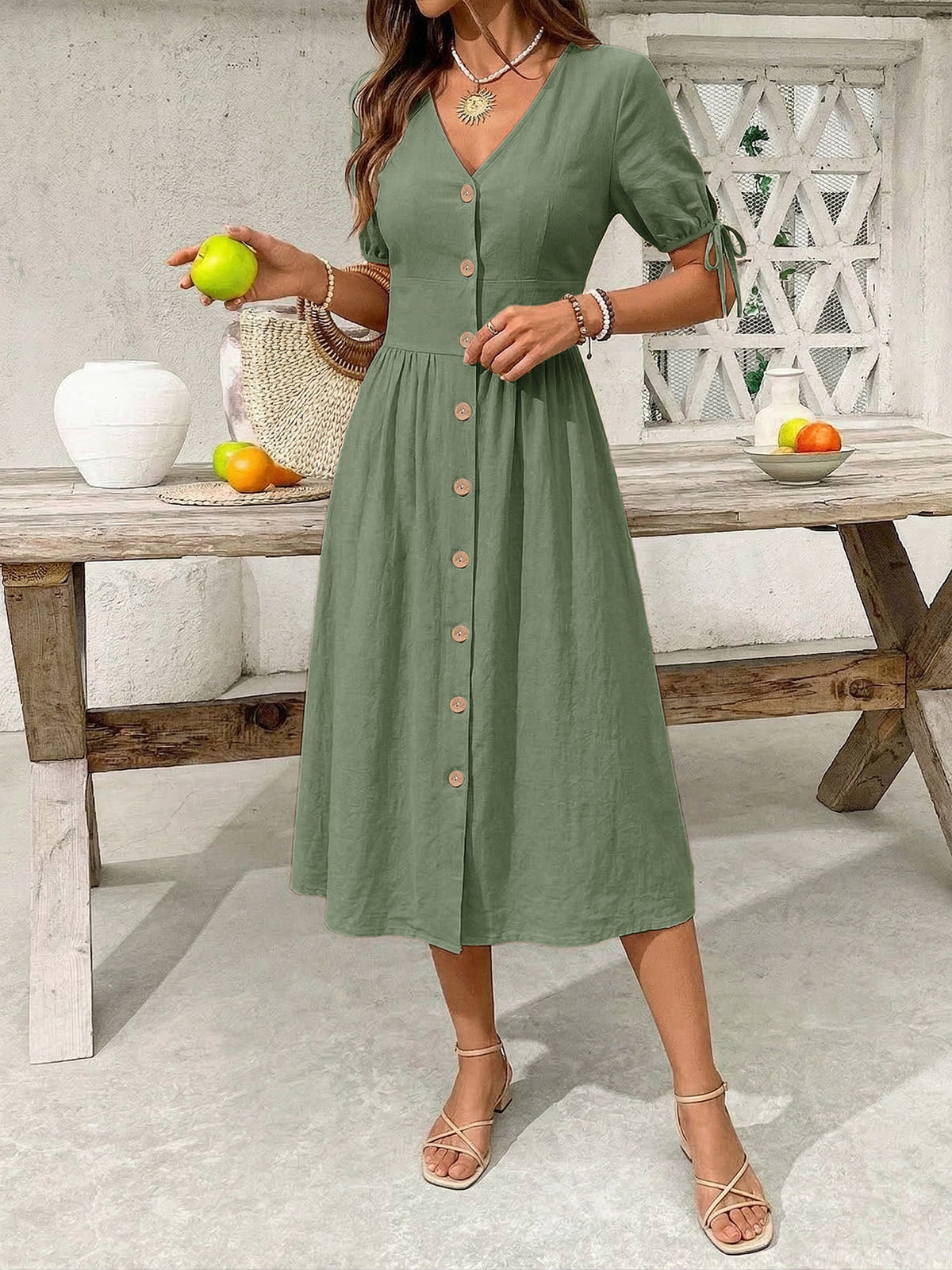 Sage button-down midi dress with tie sleeves and wooden buttons