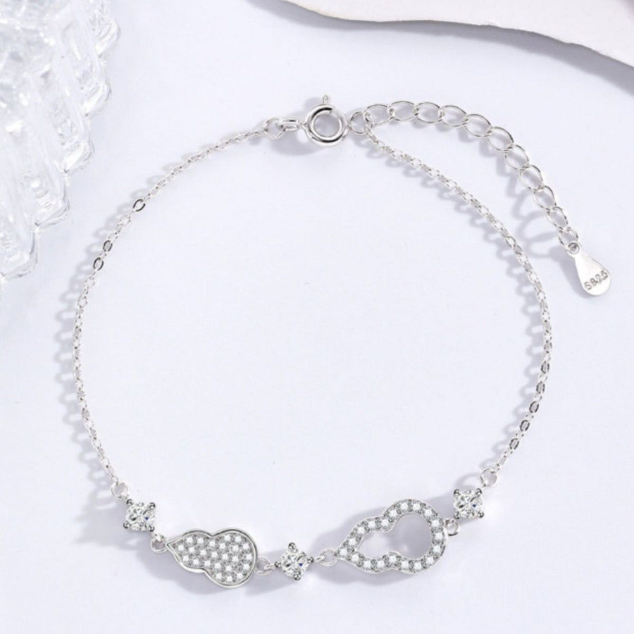 Silver adjustable bracelet with pave zircon gourd charm and infinity charm