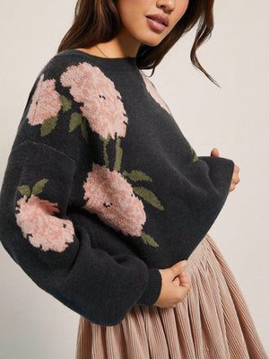 100% polyester Care instructions: Machine wash cold pullover sweater in Black with relaxed silhouette