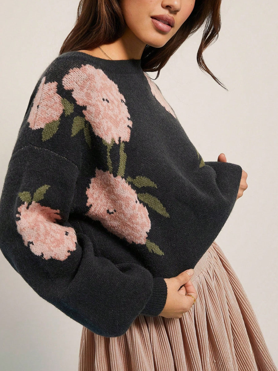 100% polyester Care instructions: Machine wash cold pullover sweater in Black with relaxed silhouette