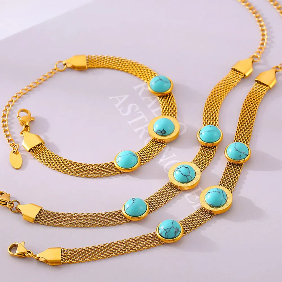 Gold mesh bracelets with turquoise stones and Roman numerals