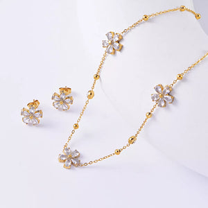 clear jewelry set featuring gold-plated and floral