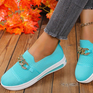Sky blue mesh slip-on flats with chunky chain detail and white soles