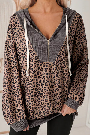 black hoodie featuring drawstring and leopard-print