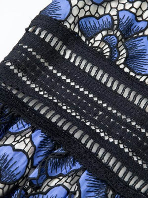 Blue floral lace midi dress with V-neck and crochet trim detail.