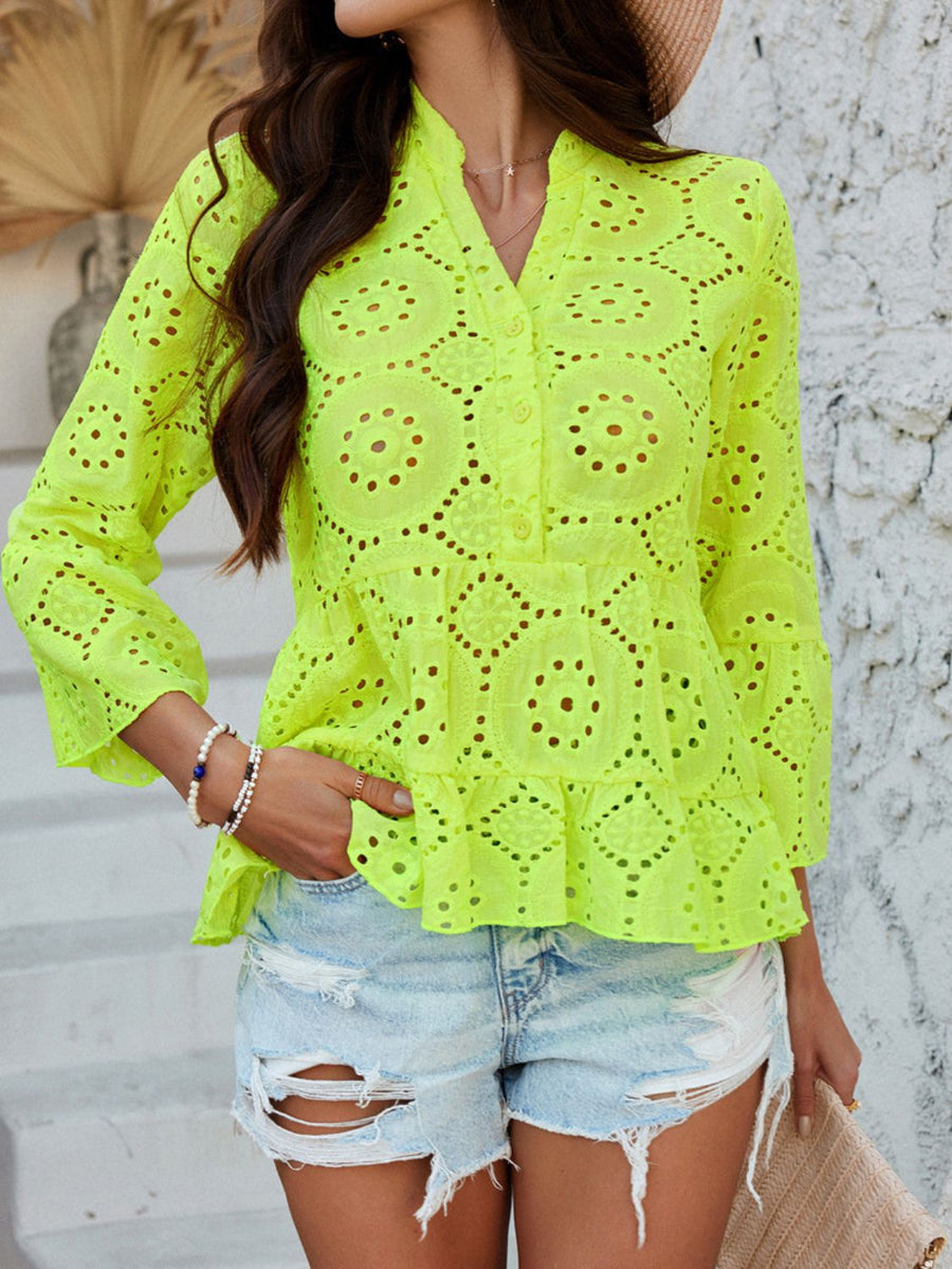 Neon yellow eyelet embroidered peplum blouse with ruffles and buttoned neckline.