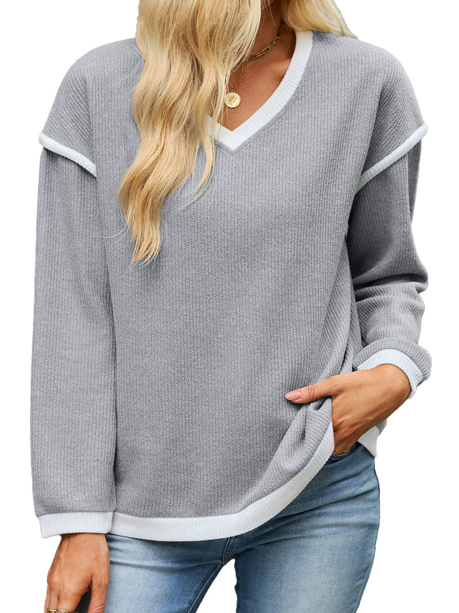 v-neck sweater in Pink with contrast stitching and hip-length