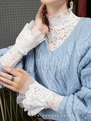 Black blouse featuring lace and floral, paisley