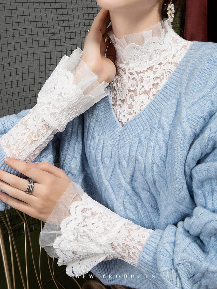 Black blouse featuring lace and floral, paisley