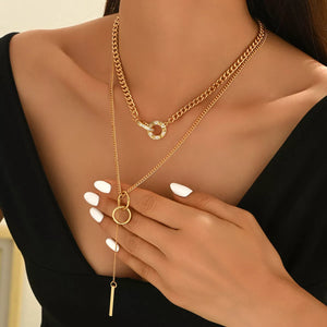 Gold layered Y-shaped pendant necklace with chain and bar details