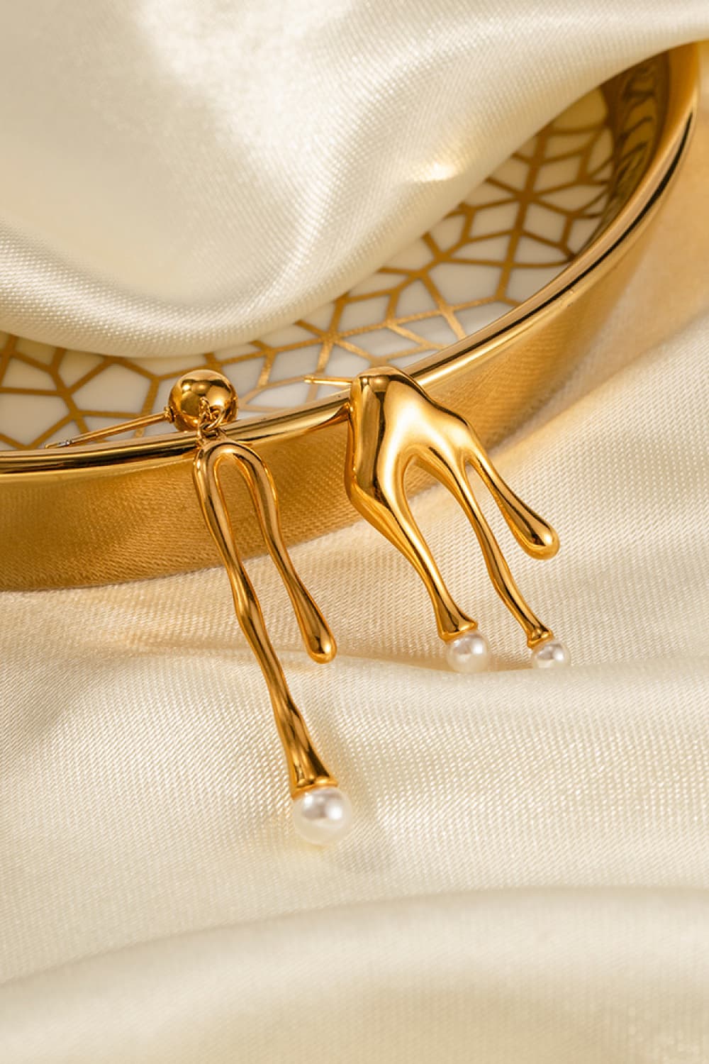 Gold abstract drip earrings with pearl accents