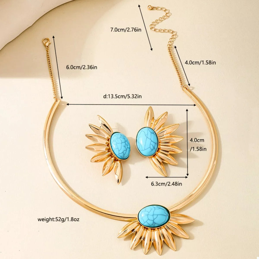 Gold sunflower jewelry set with turquoise stones and matching earrings.