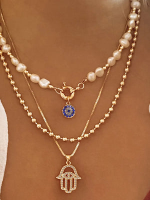 necklace in gold featuring layered design and layered fit