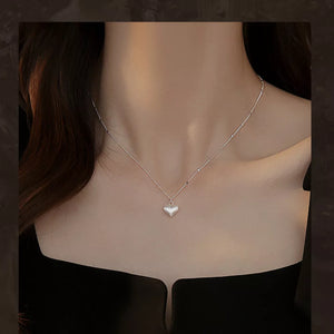 silver with necklace with heart pendant
