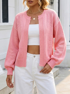 cardigan in blush pink featuring ribbed trim and relaxed fit