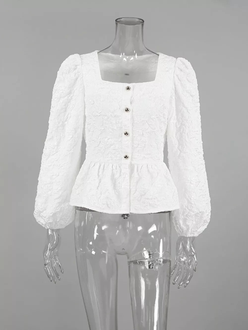 peplum top in White with textured and buttoned