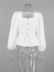 peplum top in White with textured and buttoned