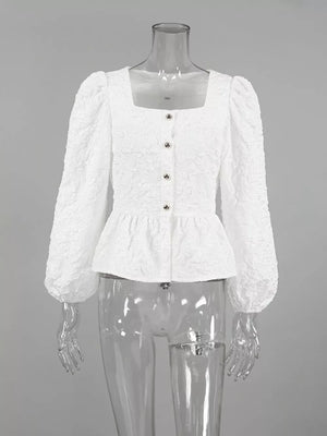 peplum top in White with textured and buttoned