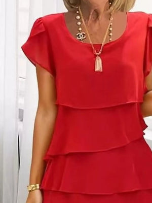 Scarlet ruffled tiered petal sleeve dress with a round neckline and layered skirt.