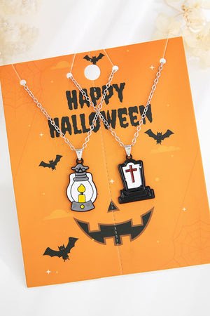 Spooky Season enamel pendant set with lantern and tombstone charms on a Halloween card.