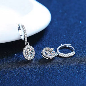 925 sterling silver,Moissanite Carat weight: 1ct Care instructions: Avoid wearin earrings in Silver with drop silhouette