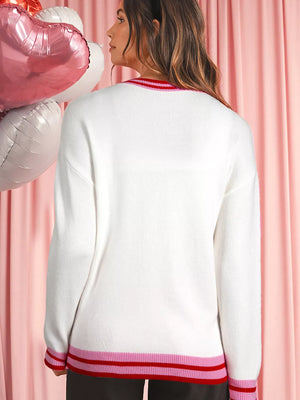 White round-neck sweater with drop shoulders and striped ribbed trim at neckline and hem.