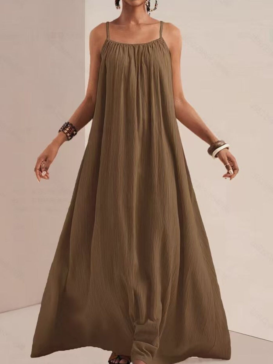 Khaki maxi swim dress with spaghetti straps and a gathered neckline.