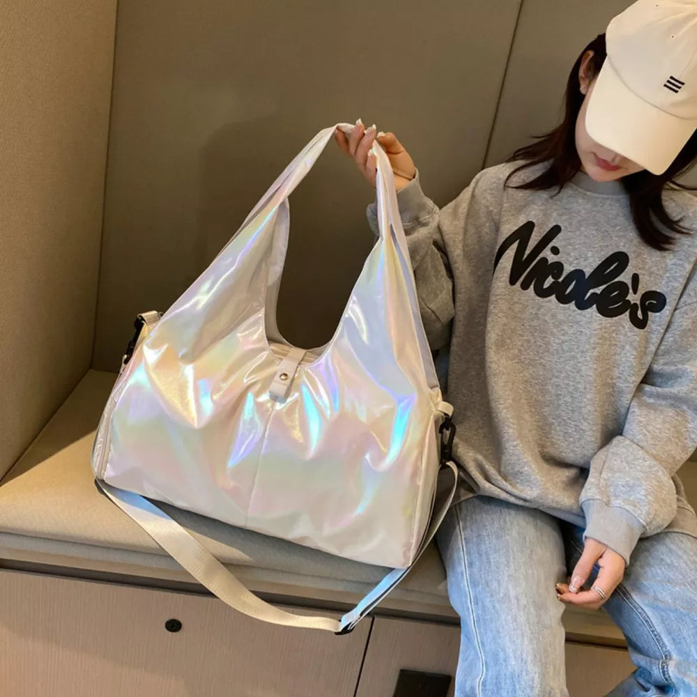 Iridescent white PVC large capacity convertible bag with adjustable strap and comfortable handle.