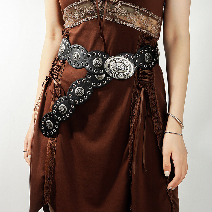Black eyelet belt with antique silver oval buckle and studs