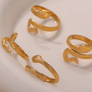 Gold textured snake wrap rings, detailed with scales, shown in Style A, B, and C.