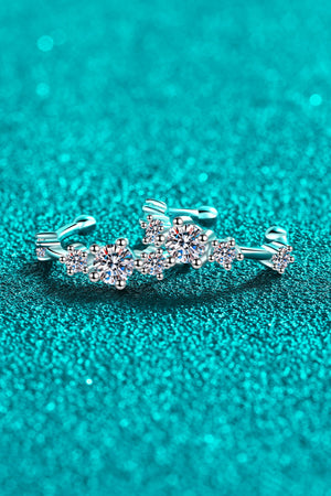 Silver ear cuffs with sparkling crystal clusters, designed as a celestial cluster.