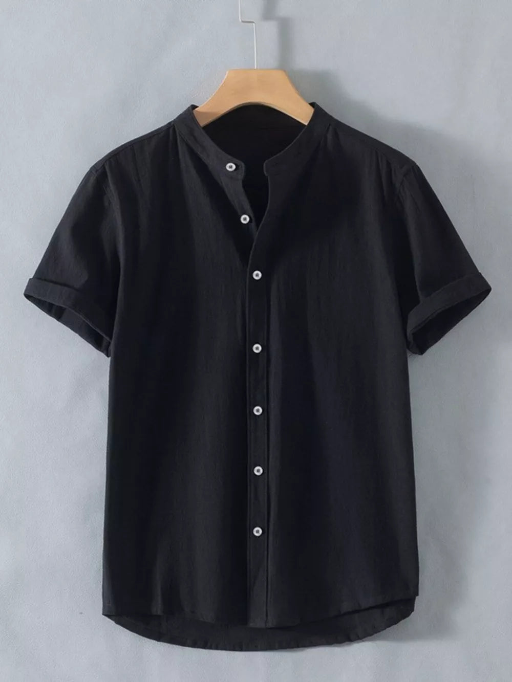 Black band collar button-up shirt with short sleeves and a casual fit.