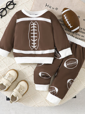 Brown baby football print top and pants set with white trim and cuffs.