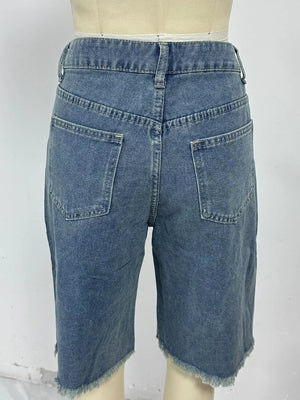 Blue denim bermuda shorts with frayed hem and relaxed fit.