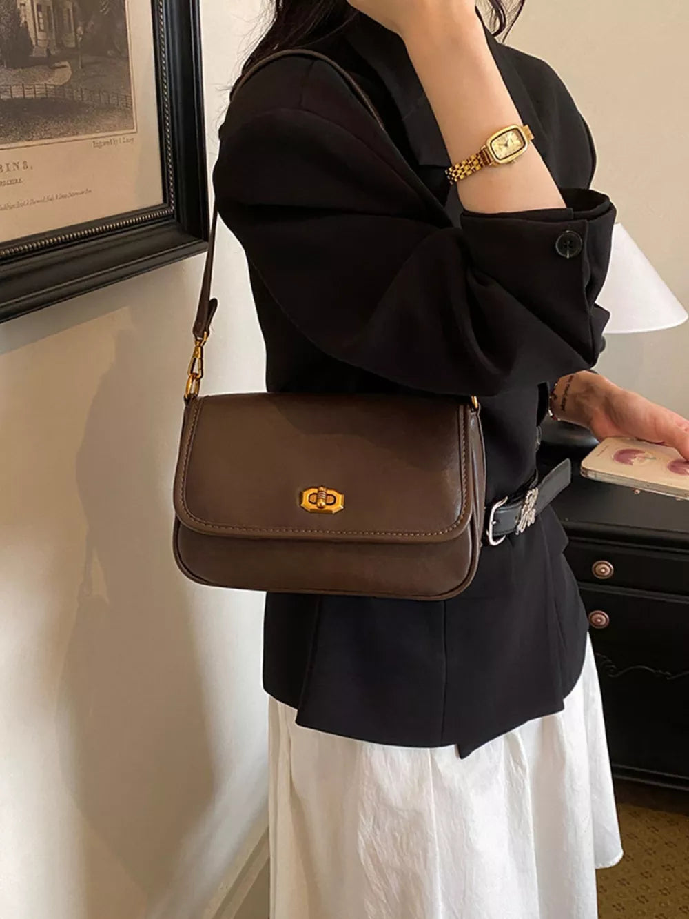 shoulder bag in Brown with flap closure and small