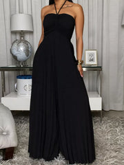 Red jumpsuit featuring pleated and pleated