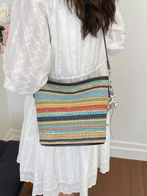 crossbody bag in light blue with adjustable strap and medium
