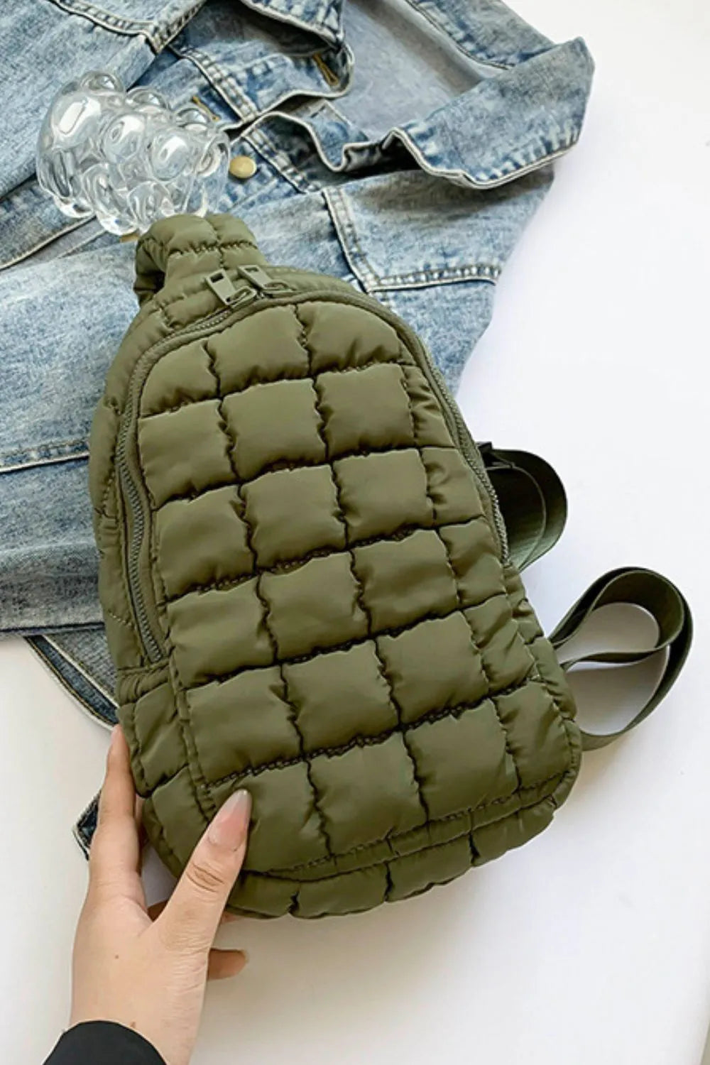 Padded sling bag in Army Green with quilted pattern and top handle