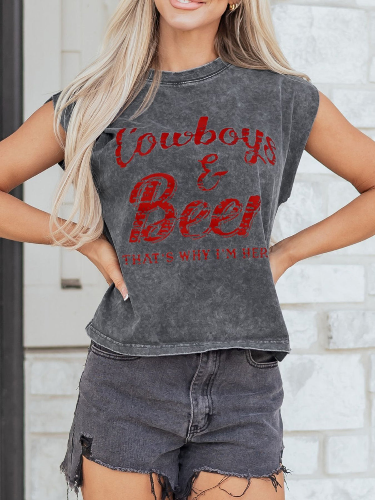 Acid-washed dark gray cotton tank top with red Cowboys & Beer graphic and raw hem.