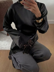 ivory blouse with asymmetrical hem and bell sleeve