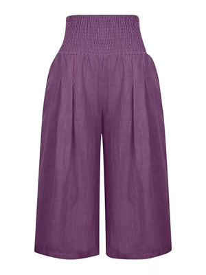 Purple linen culottes with smocked high waist and wide legs.
