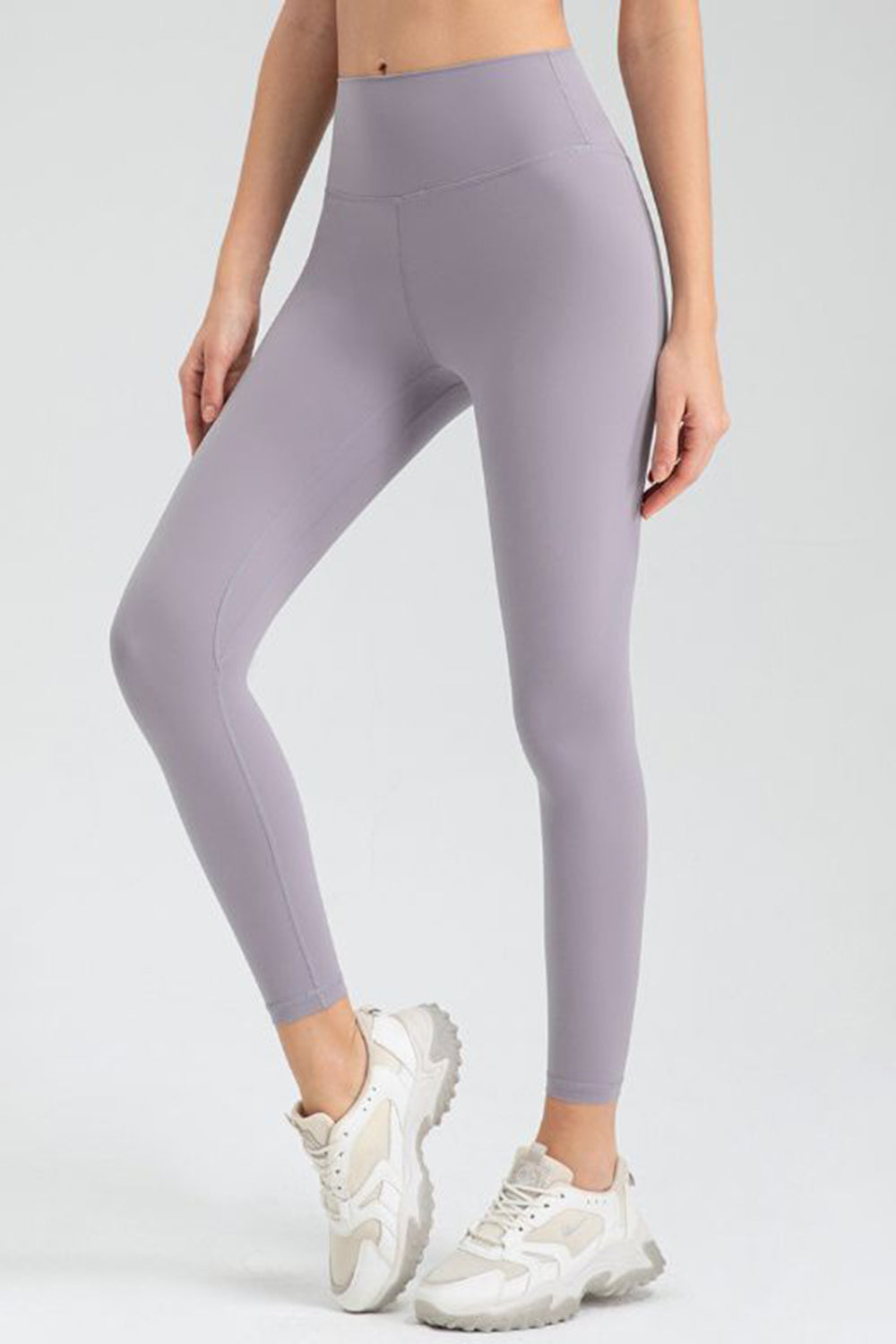 Lavender high-waist performance leggings with sculpted seams.