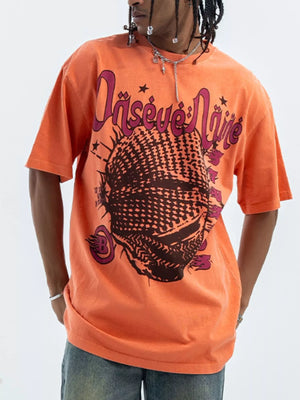 Orange cotton graphic oversized half sleeve tee with a distressed look and bold graphic print.