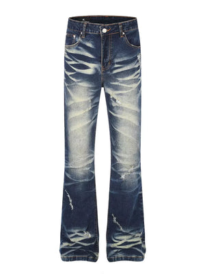 Distressed flare jeans in dark wash blue cotton with pocket details and button fly.