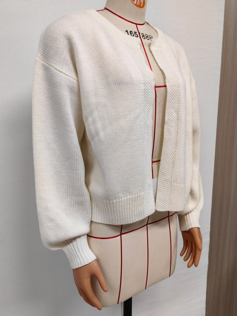 cardigan in White with round neck and long sleeve