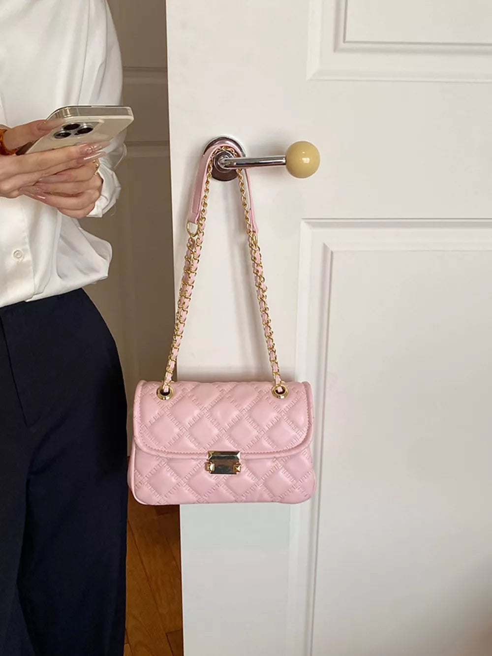crossbody bag in blush pink featuring quilted and boxy fit
